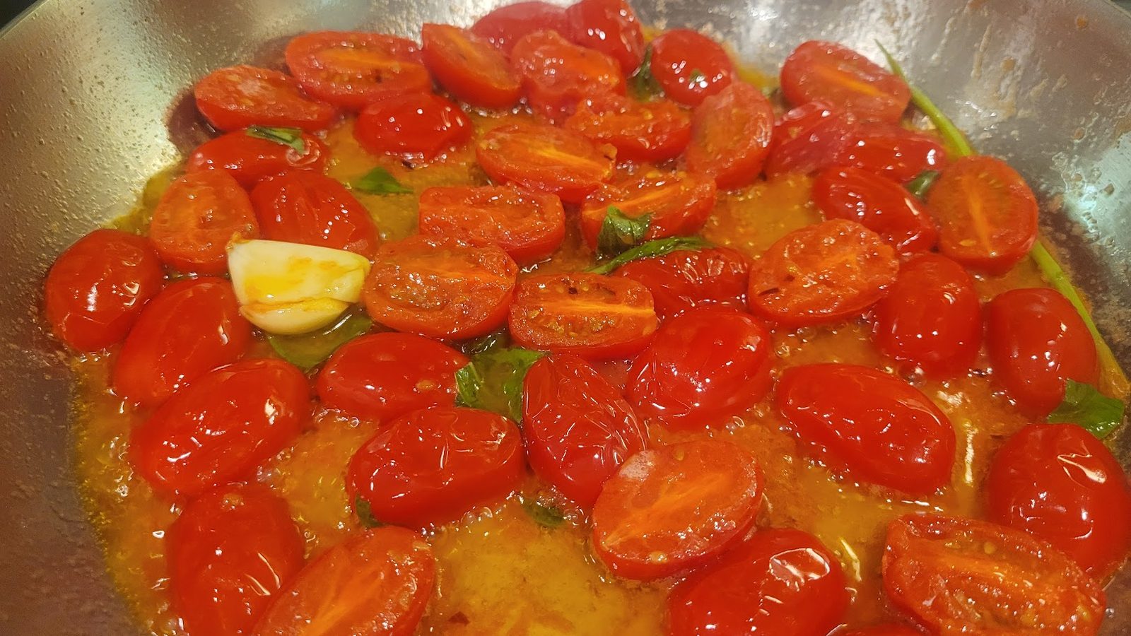 Rigatoni with cherry tomatoes, basil, and Parmigiano Reggiano