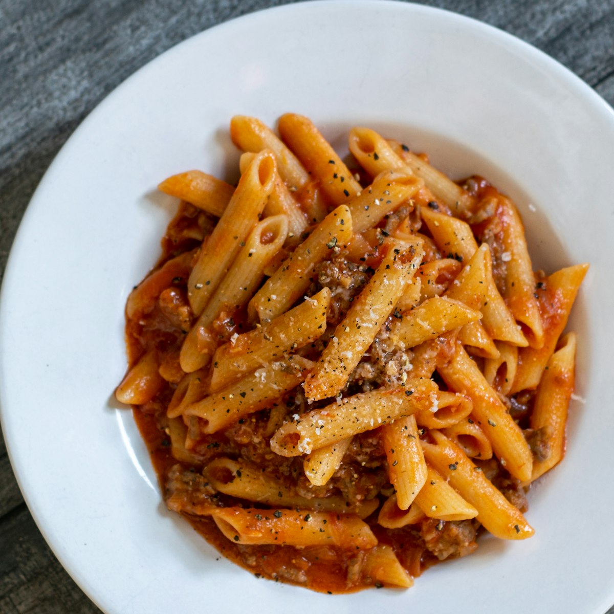 Rigatoni with cherry tomatoes, basil, and Parmigiano Reggiano
