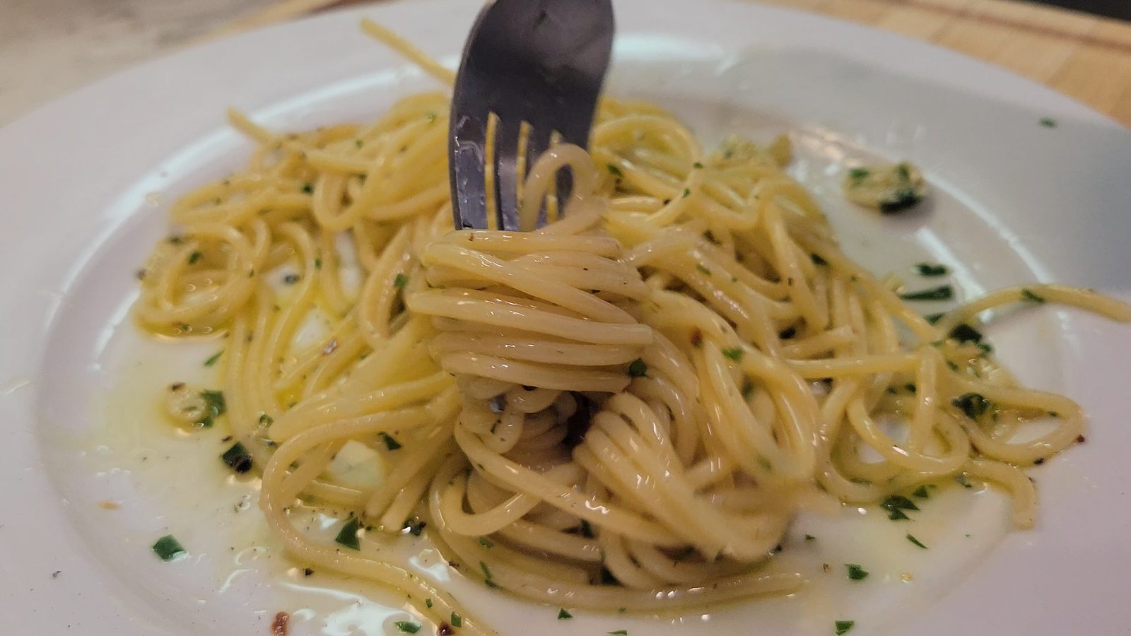 Spaghetti aglio e olio with garlic, olive oil, and parsley